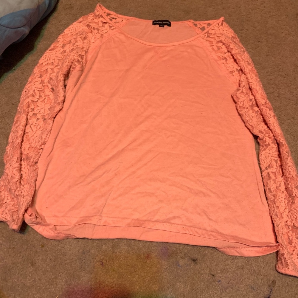 A nice long sleeve shirt with lace for sleeves